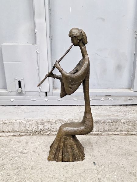 Статуэтка "Музыкантша (на духовых)" Статуэтка "Музыкантша (на духовых)"