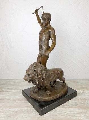 Лев и его укротитель