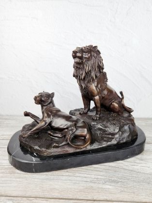 Лев и львица